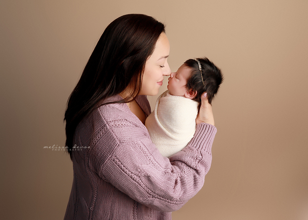 Newborn portrait with mom and baby