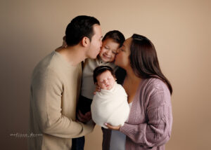 Family photo with new baby