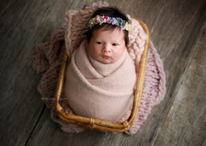 Baby girl photo posed in pink