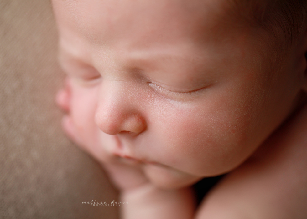 Close-up detail shot of baby boy's face