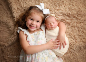 baby with sibling photo