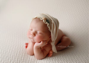 newborn in froggy pose