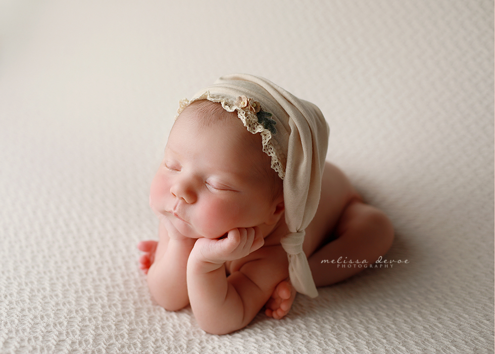 newborn in froggy pose