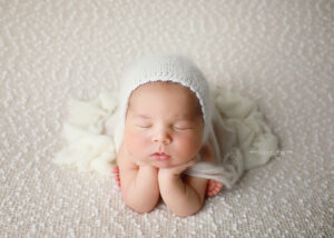 Baby girl in froggy pose