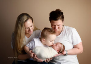 baby and family portrait