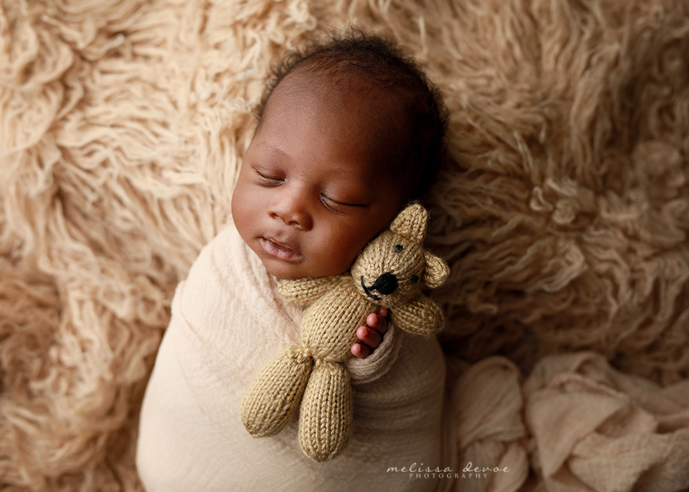 newborn posed with bear