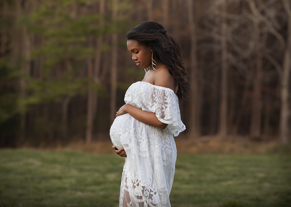 Maternity photo with Mom in white dress in field